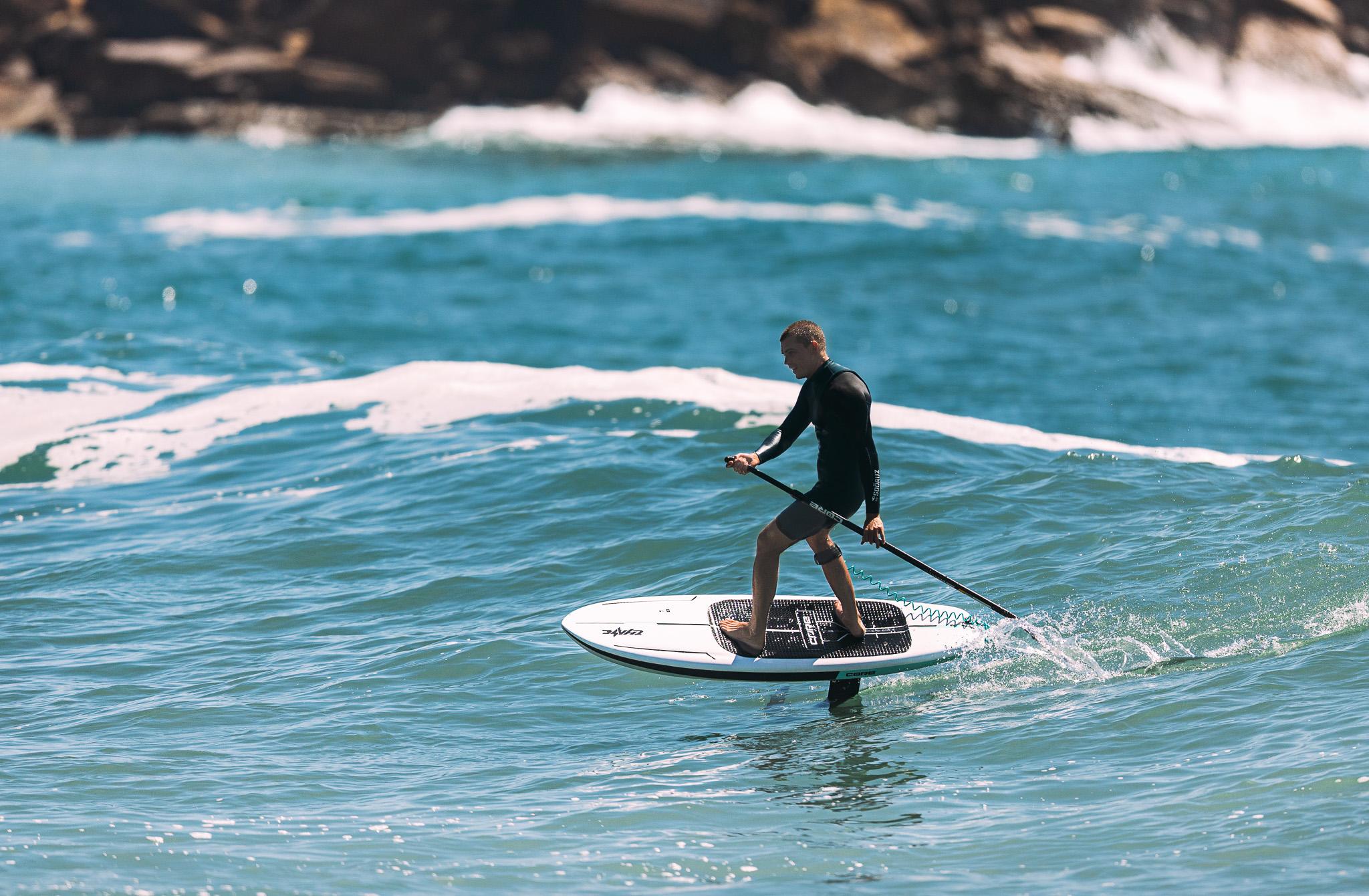 CORE Chase - Willow is carving down a wave